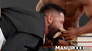 Man with a beard slaps himself while being restrained