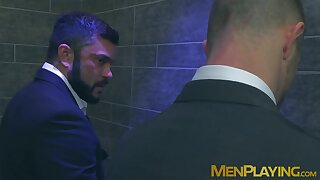 Sexy men in suit gets steamy on rough gay sex in a restroom