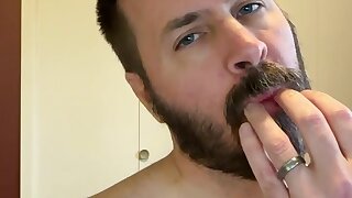 Caged daddy faggot licks precum from his nub