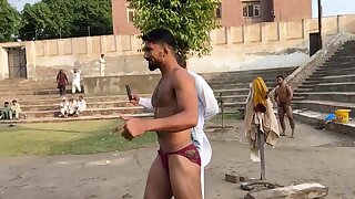 Handsome Indian wrestler takes shower after practice