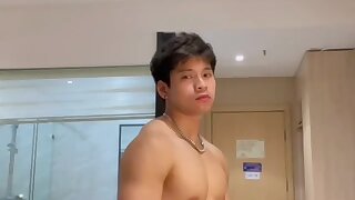 308 Asian Bodybuilder plays with his ass
