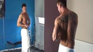 Young muscle stud oiling up