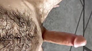 Gooned out hairy guy lets his hard cock squirt piss all over himself and his hotel room