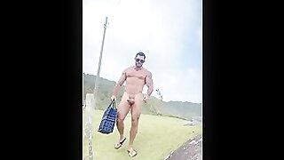 Brazilian muscle daddy arrives at the beach