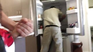 Wank behind fridge repair man
