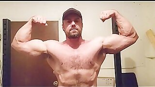 Dan Lang flexes biceps