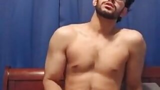 Muscular Indian college boy jerks off