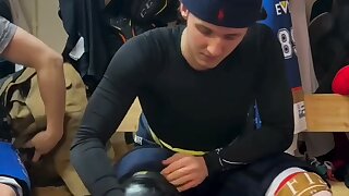 Watch a cute jock get into Hockey gear.