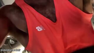 Hairy muscular stud gets all sweaty at the gym and shows off his pits and bulge