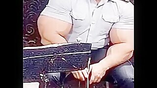 Massive Biceps in ultra-tight Military Shirt