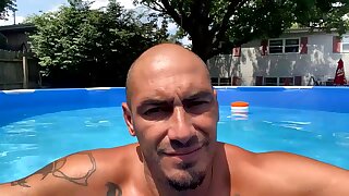 Naked tatted white guy in the pool flashes his ass hole