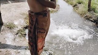 Desi villager bathing outdoor