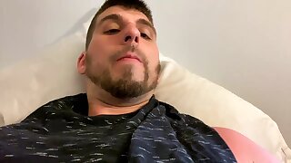 He flashes his bushy hard dick in his red shorts